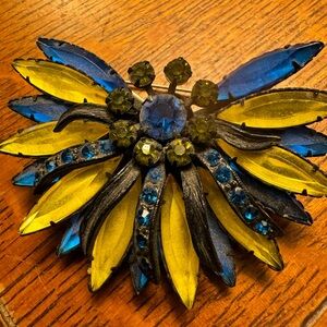 Vintage broach was my grandmothers. Has to be 50 plus years old